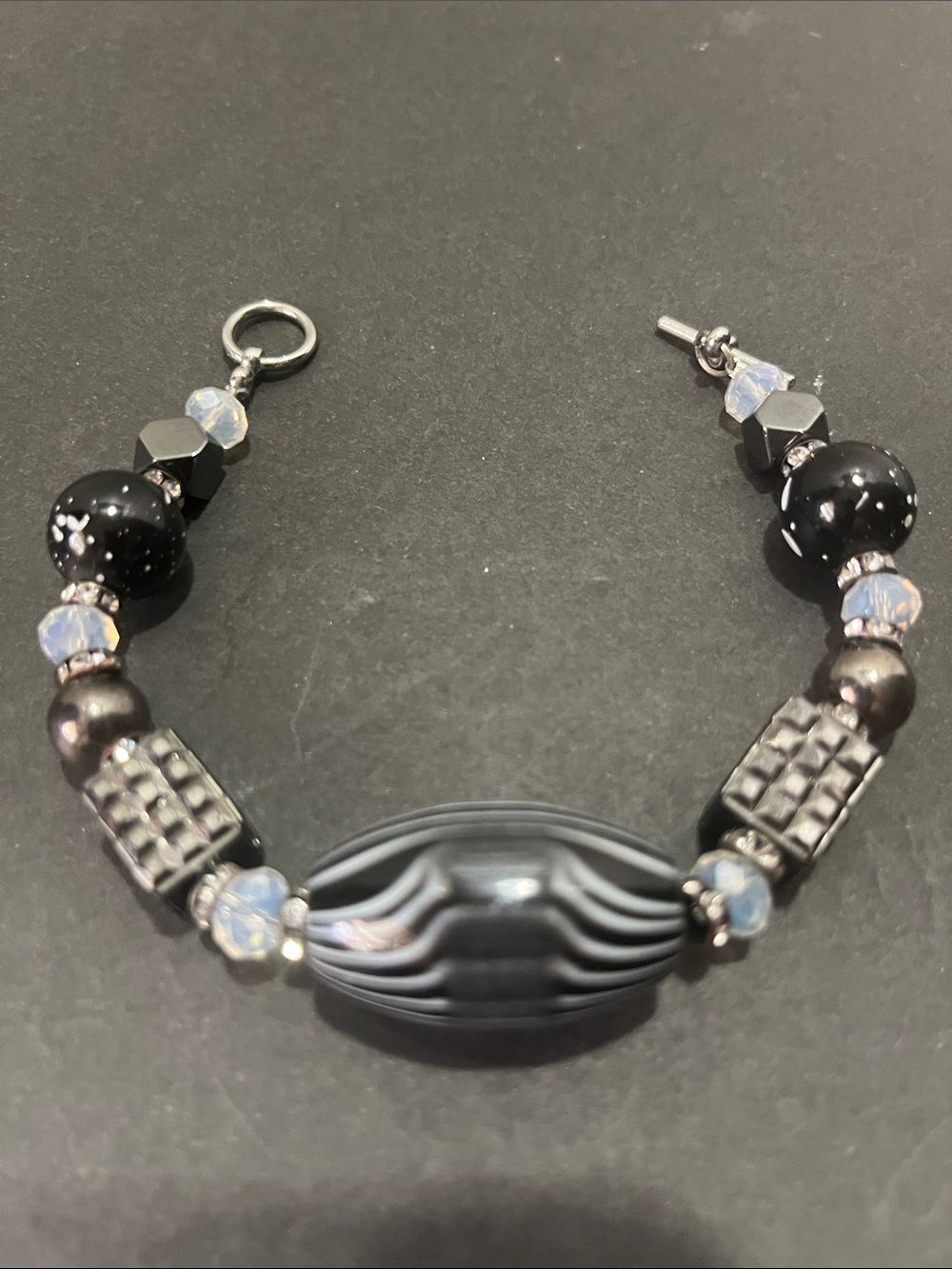 Handcrafted Black Bead Bracelet with Iridescent Accents